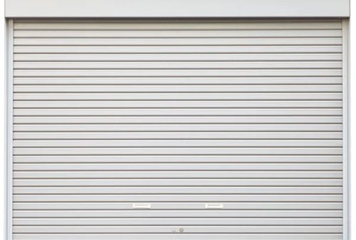 depositphotos 56938461 stock photo white grunge metallic roller shutter - Persianas metálicas Barcelona